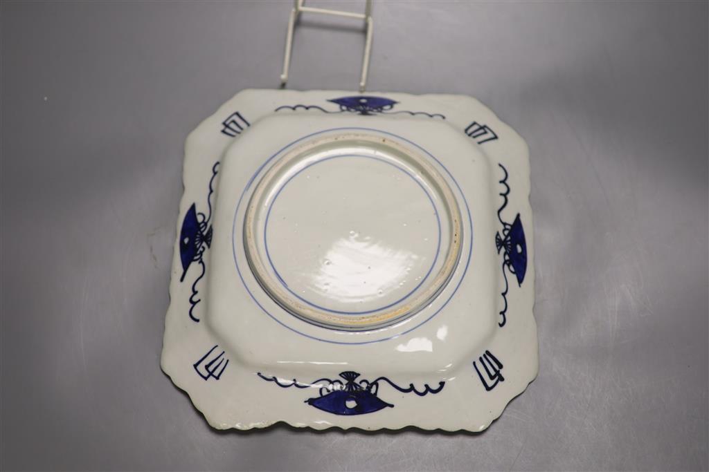 A Dresden porcelain three handled cup, an Imari dish and one other dish